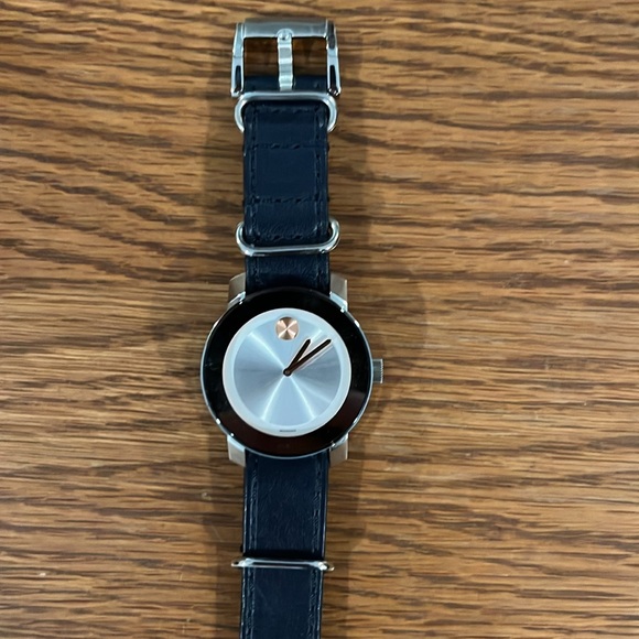 Movado women’s watch. Blue strap with stainless steal and rose gold face. - Picture 2 of 4